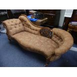 A Victorian walnut double ended Chaise Longue Sofa, with serpentine seat, a pierced splat in show