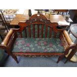 A Chinese export caned rosewood sofa, with shaped arched back, carved crest and scroll arms, 46in (