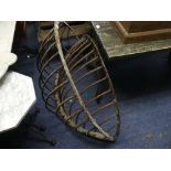 A pair of vintage metal Hay Racks, of half moon shape, 37in (94cm) wide (2)