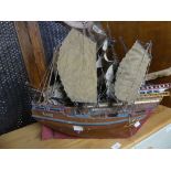 Three mid 20thC model sailing Ships: a Chinese Junk, a Viking Ship and 'James Cook', all in need