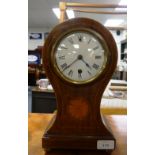 An Edwardian balloon-shaped Mantel Clock, the mahogany case, with central fan inlay, enclosed by