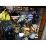 A quantity of novelty Teapots and various Ceramics, including a Green and Gilt pattern Teapot ,