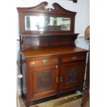 An Edwardian mahogany mirrored-back Sideboard, the swan neck pediment above the bevelled edge