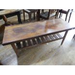 A retro teak Coffee Table, the rectangular top raised upon slatted under tier, 48in (122cm) wide x
