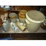 Vintage stoneware: three Jars and three foot warmers, together with three antique copper pans, brass