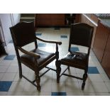 A set of seven early 20thC oak Dining Chairs, with studded leather upholstery, including one