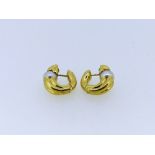A pair of 18ct yellow gold and cultured pearl hoop Earrings, with integral hinged pillar fixing,
