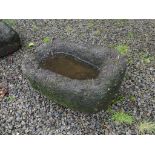 An antique granite rectangular Trough, 26in long x 17in wide x 12in high (66cm x 43cm x 30.5cm).