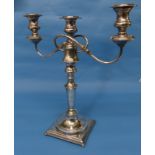 A silver plated three light Candelabra, the scroll arms detachable to leave a single central