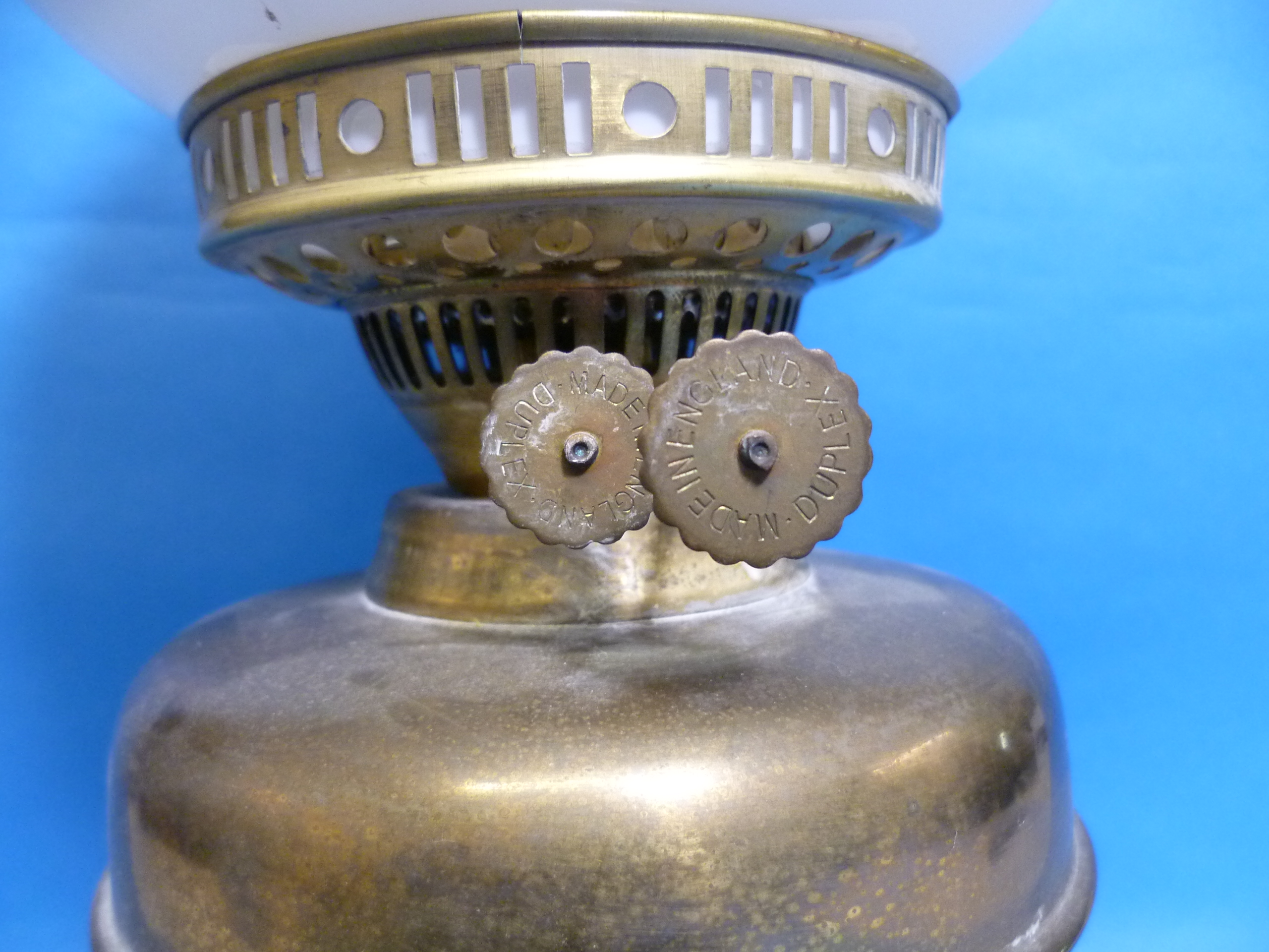 A Victorian brass Oil Lamp, with white glass globe and clear funnel, 19½in (49.5cm) high. - Image 2 of 2