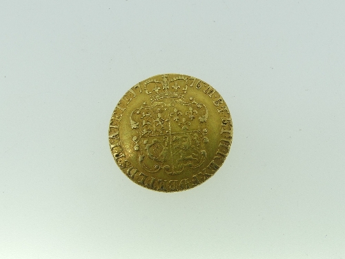 A George III gold Guinea, dated 1776, with crowned shield coat of arms reverse, 8.4g, 24mm