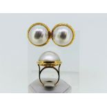 A cultured mabe pearl Earring and Ring Suite, each pearl 19mm diameter, the earrings with pillar and