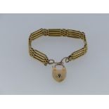 A 9ct gold flexible link Bracelet, with 9ct padlock clasp, approx total weight 16.5g.