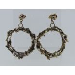 A pair of large 9ct yellow gold Hoop Earrings, formed of twisting foliage, all marked 9ct, 1¾in (4.