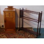 An early 20th century Towel Rail, together with a pot cupboard (2)