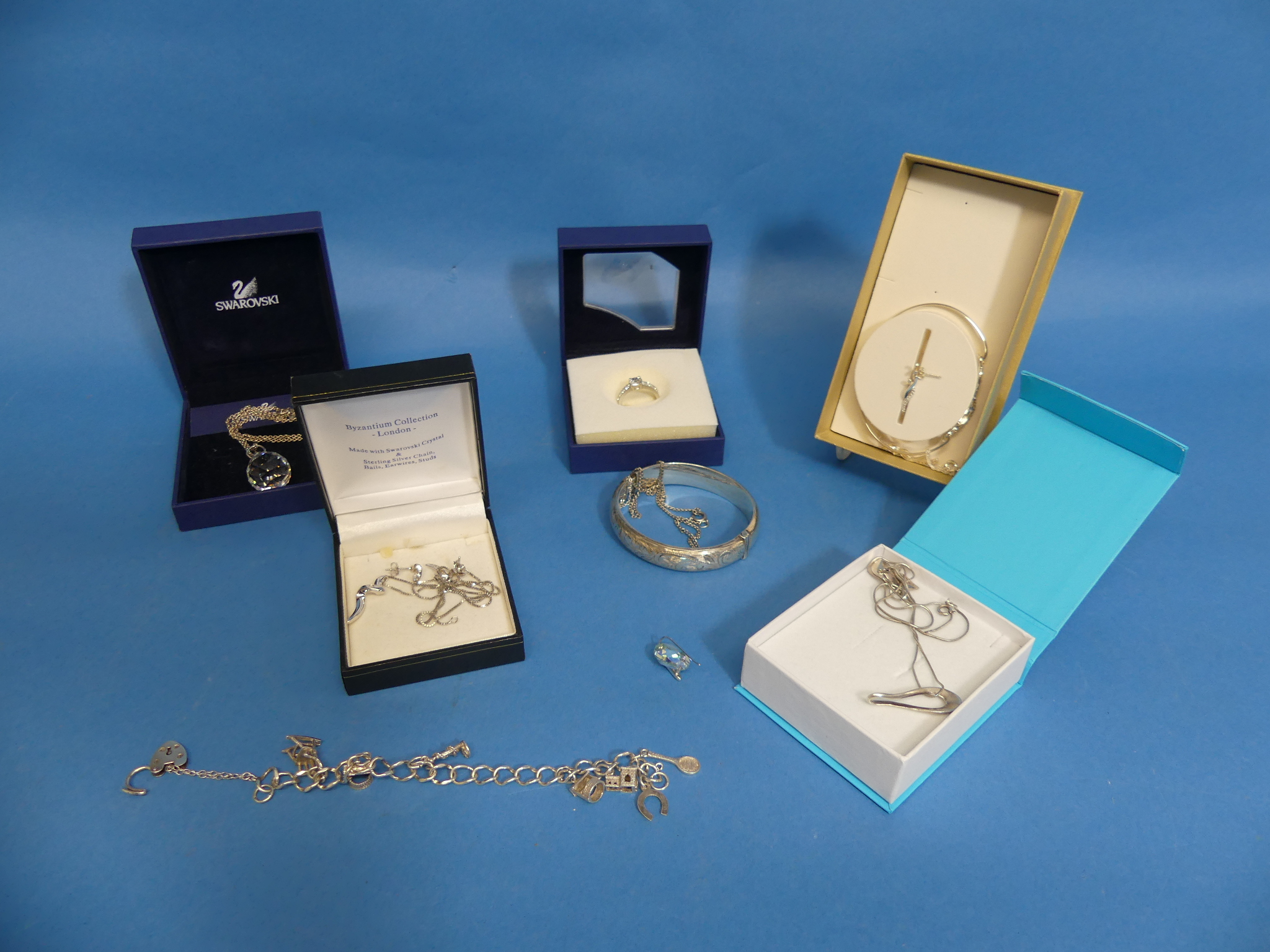 A collection of Silver Jewellery, including a Swarovski necklace, a Swarovski dress ring, a silver