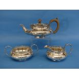 A George V silver three piece Tea Set, by Walker & Hall, hallmarked Birmingham, 1918 (the cream