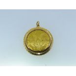 A Mexican 50 Peso Gold Coin, in an 18ct yellow gold mount, approx total weight 48.6g.