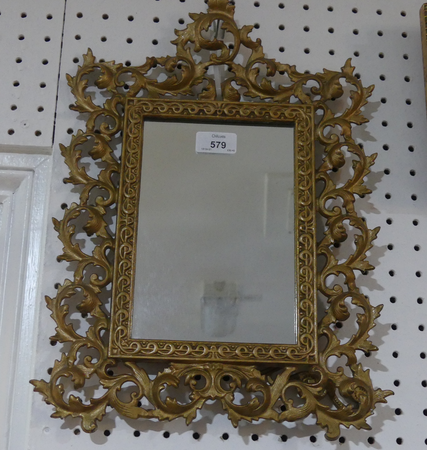 An early 20thC Rococo-style Mirror, the rectangular mirror plate enclosed in pierced scroll and - Image 2 of 2