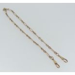 A 9ct rose gold Watch Chain, formed of one long rectangular links with three circular links between,