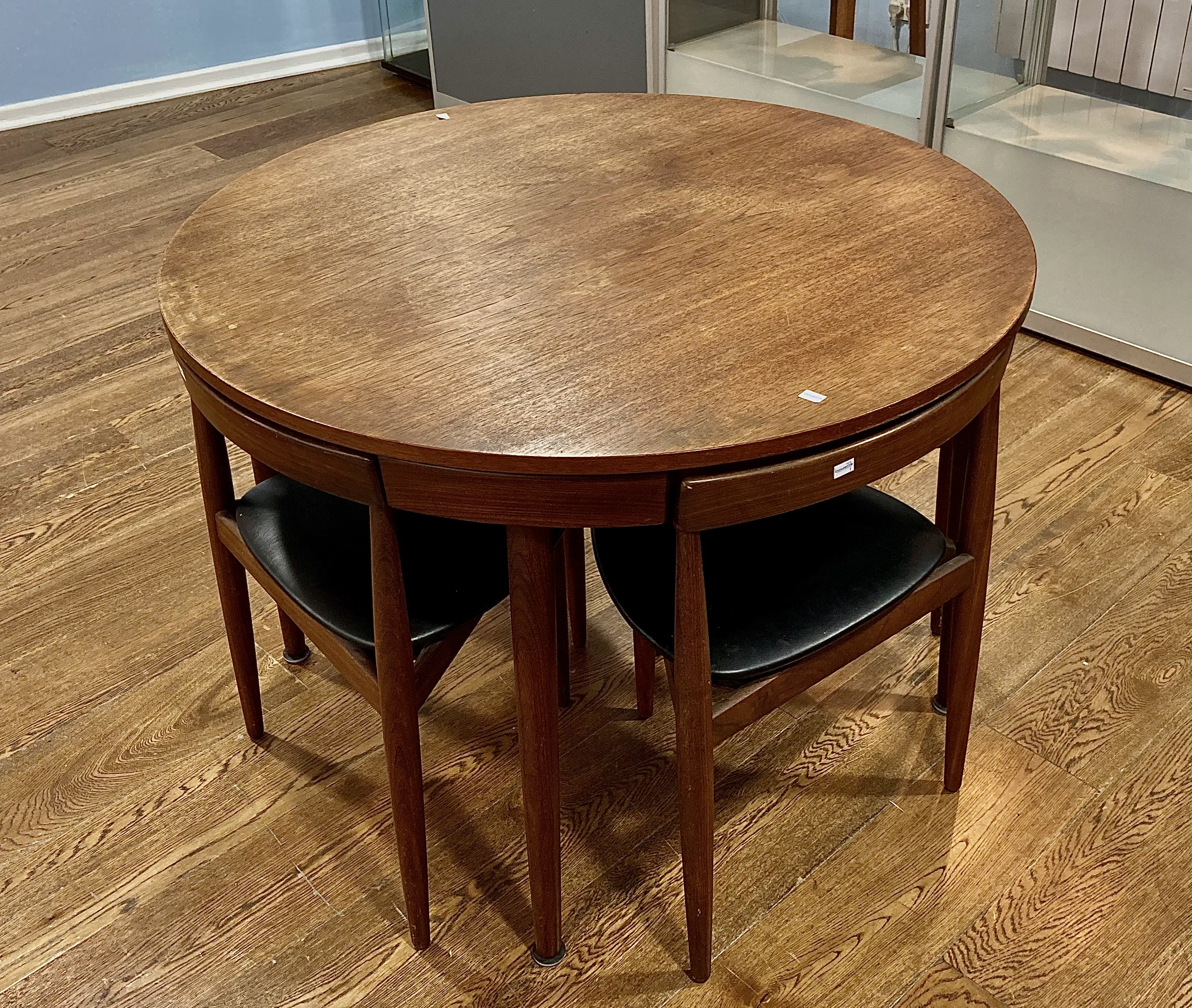 A retro Danish teak 'Nesting' Dining Suite designed by Hans Olsen for Frem Rojle, the roundette