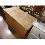 A vintage stripped pine Trunk, of rectangular form with hinged lid, 42in (106.5cm) wide x 21in (53.