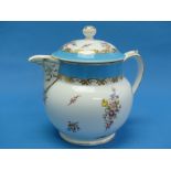 A small quantity of ceramic Teapots, including a large Teapot, decorated in floral sprays,