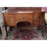 A Georgian mahogany break-fronted Sideboard, the fan shape with boxwood stringing, above central