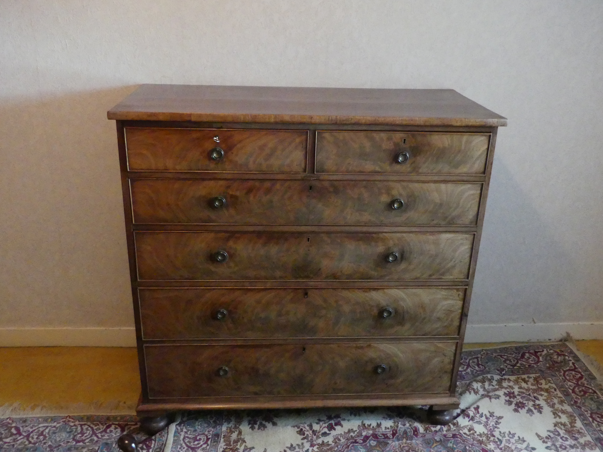 An antique Chest of Drawers, 46in (117cm) wide x 21in (53.25cm) deep x 47in (119.25cm) high.