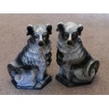 A pair of Staffordshire pottery Fireside Dogs, inset glass eyes, 13in (33cm) high (2)