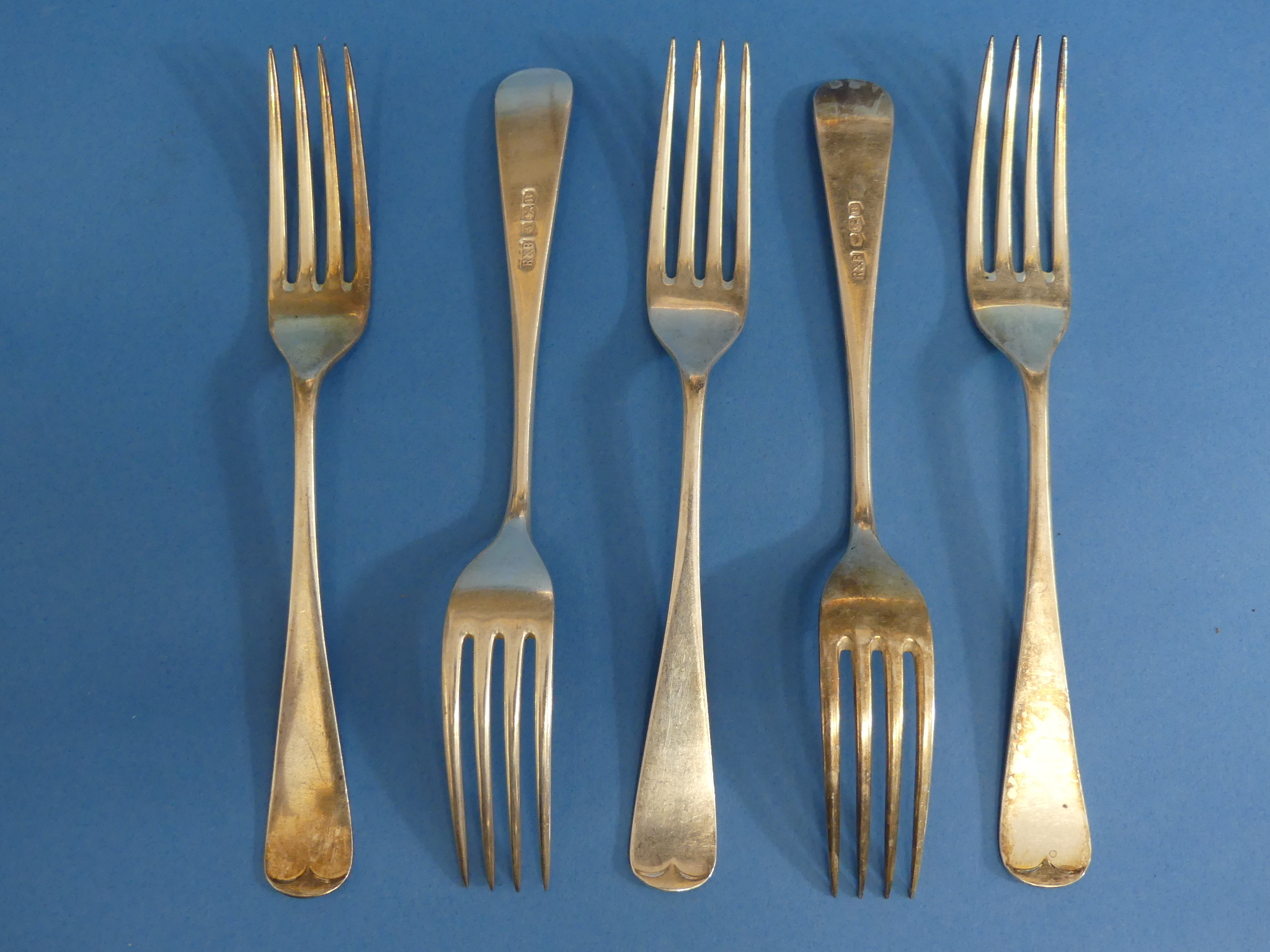 A set of five George VI silver Forks, by Roberts & Belk Ltd., hallmarked Sheffield, 1944, Old