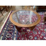 A retro G-Plan Astro teak and glass topped circular Coffee Table, 33in (84cm) diameter.