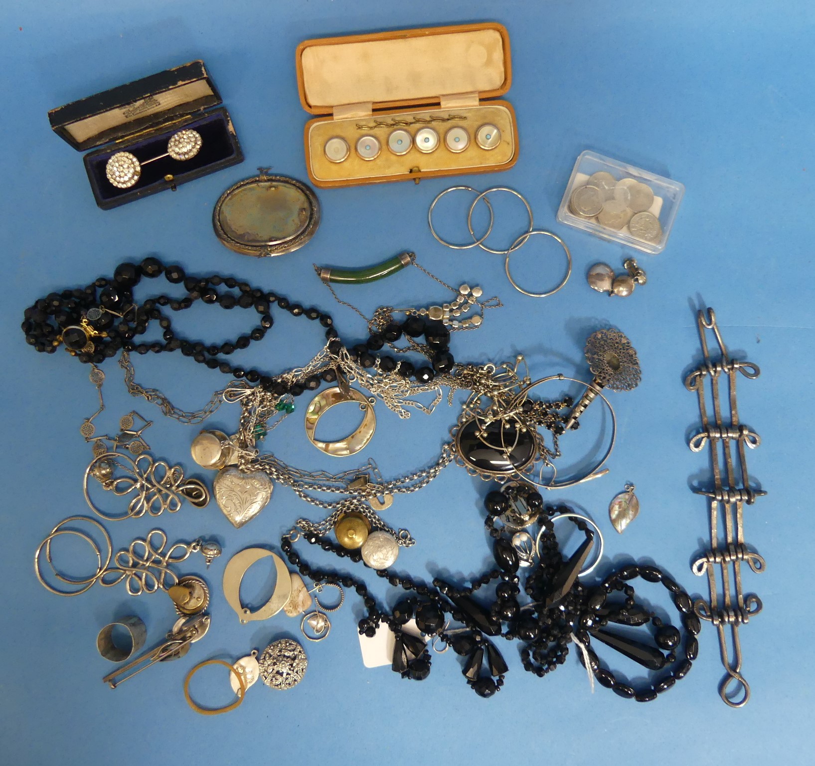 A collection of Silver and Costume Jewellery, including a New Zealand jade pendant, abalone shell