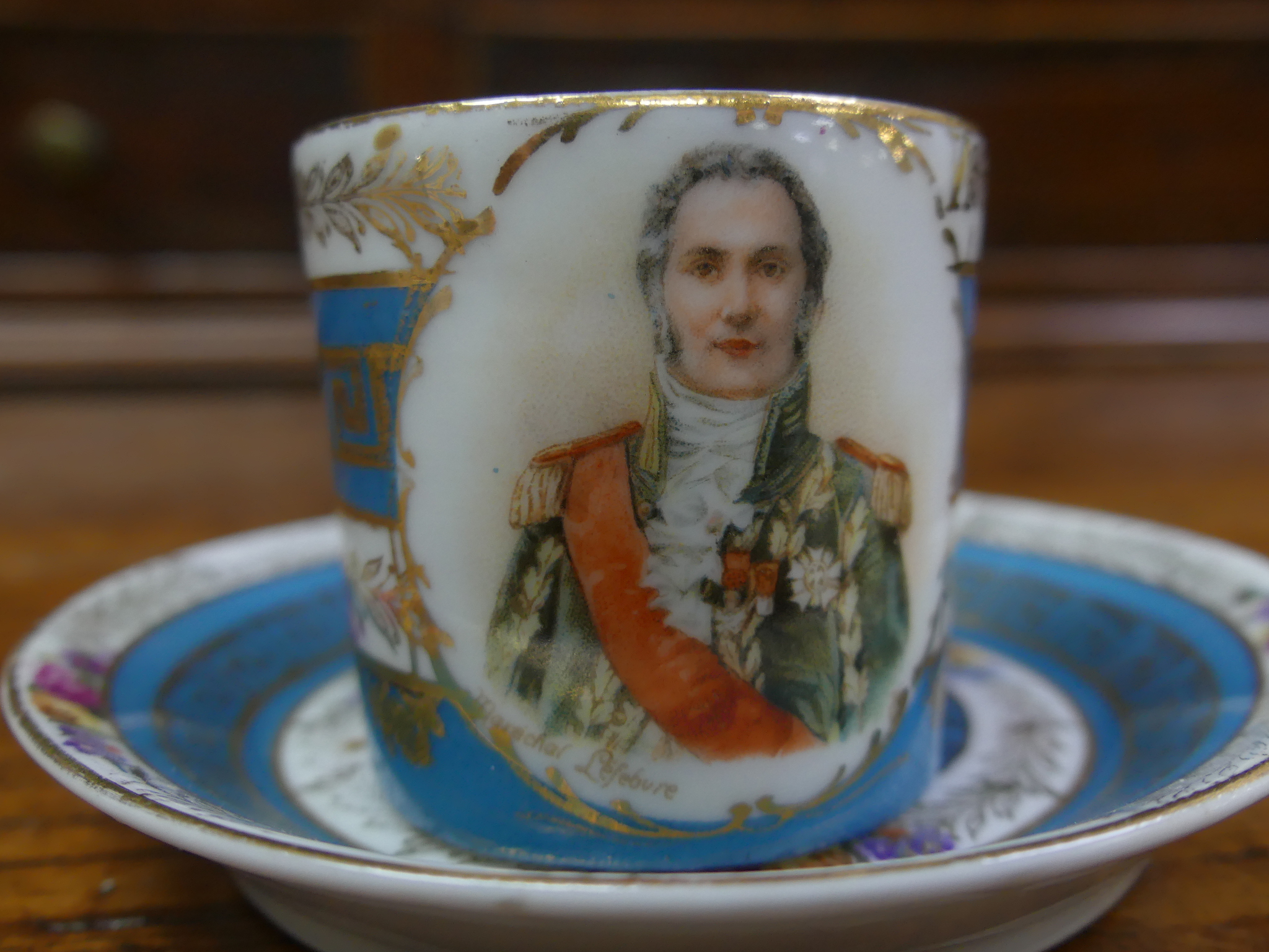 A fine 19thC Vienna porcelain miniature Cabinet Cup and Saucer, the blue and white banded ground