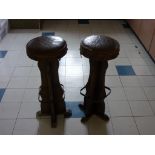 A pair of 20thC high Stools, with circular leather seats, 30in (76cm) high, seats 12in (30.5cm)