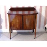An antique bow-front Cabinet, 30in (76cm) wide x 19in (48.25cm) deep x 32in (81cm) high.