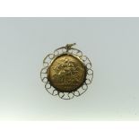 A George V gold Half Sovereign, dated 1913, in 9ct gold pendant mount, approx total weight 5.9g.