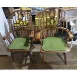 A pair of mid 20thC beech Windsor-back armchairs, with green padded seats, 43in (110cm) high x