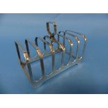 An Elizabeth II silver seven bar Toast Rack, by Elkington & Co., hallmarked Birmingham, 1966,