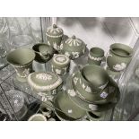 A large quantity of Wedgwood Jasperware, of green ground, all decorated with classical scenes,