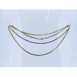 An 18ct yellow gold snake link Chain, 23in (59cm) long, approx total weight 7.9g.
