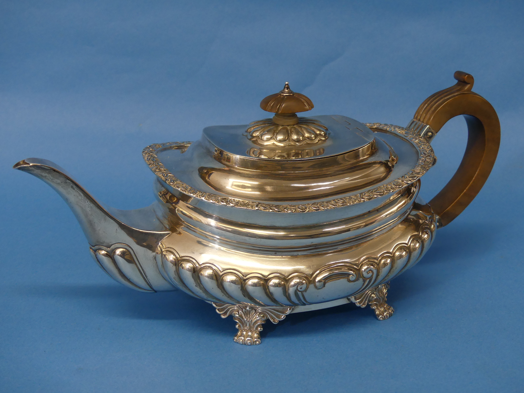 A late Victorian silver Teapot, by Charles Stuart Harris, hallmarked London, 1897, of ovoid form