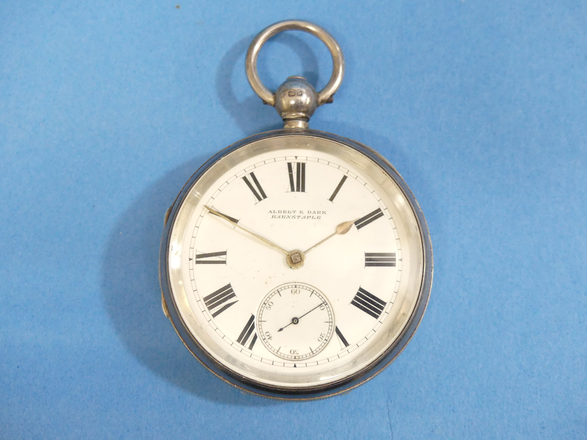 A silver cased open face Pocket Watch, key wing, the white enamel dial with black Roman numerals and