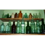 A collection of late 19thC and early 20thC glass and stoneware Bottles, including five North Devon