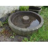 A antique granite circular Grinding Trough, 52in diameter x 26in high (132cm x 26cm). Note; This lot