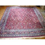 A Tabriz Carpet square, 135in (343cm) wide x 156in (396cm) long.