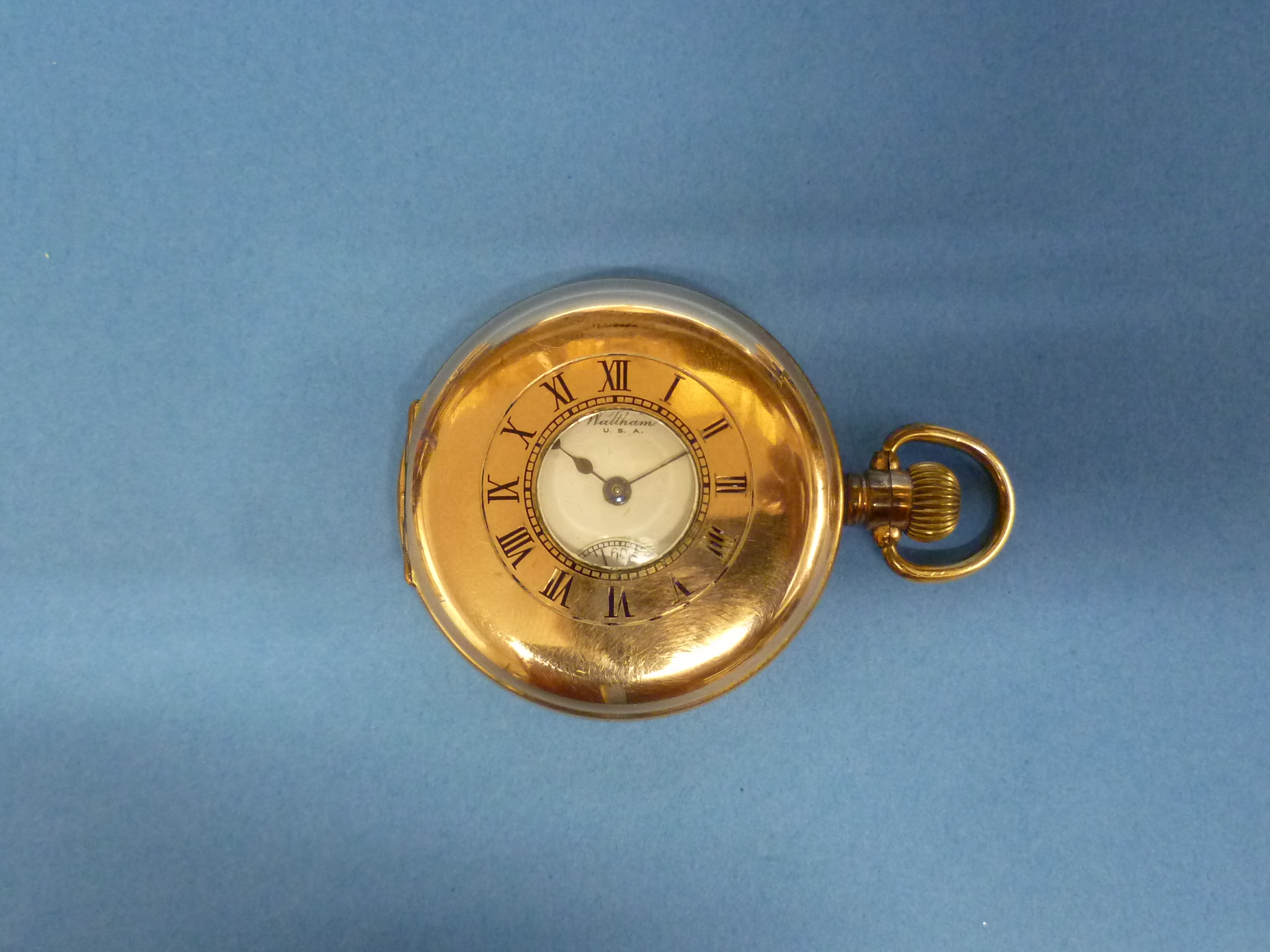 A gold-pated Waltham half-hunter Pocket Watch, the dial with black Roman numerals and subsidiary