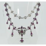 A Palais Royale style paste Necklace, set with eight open scroll links each set two pink pastes