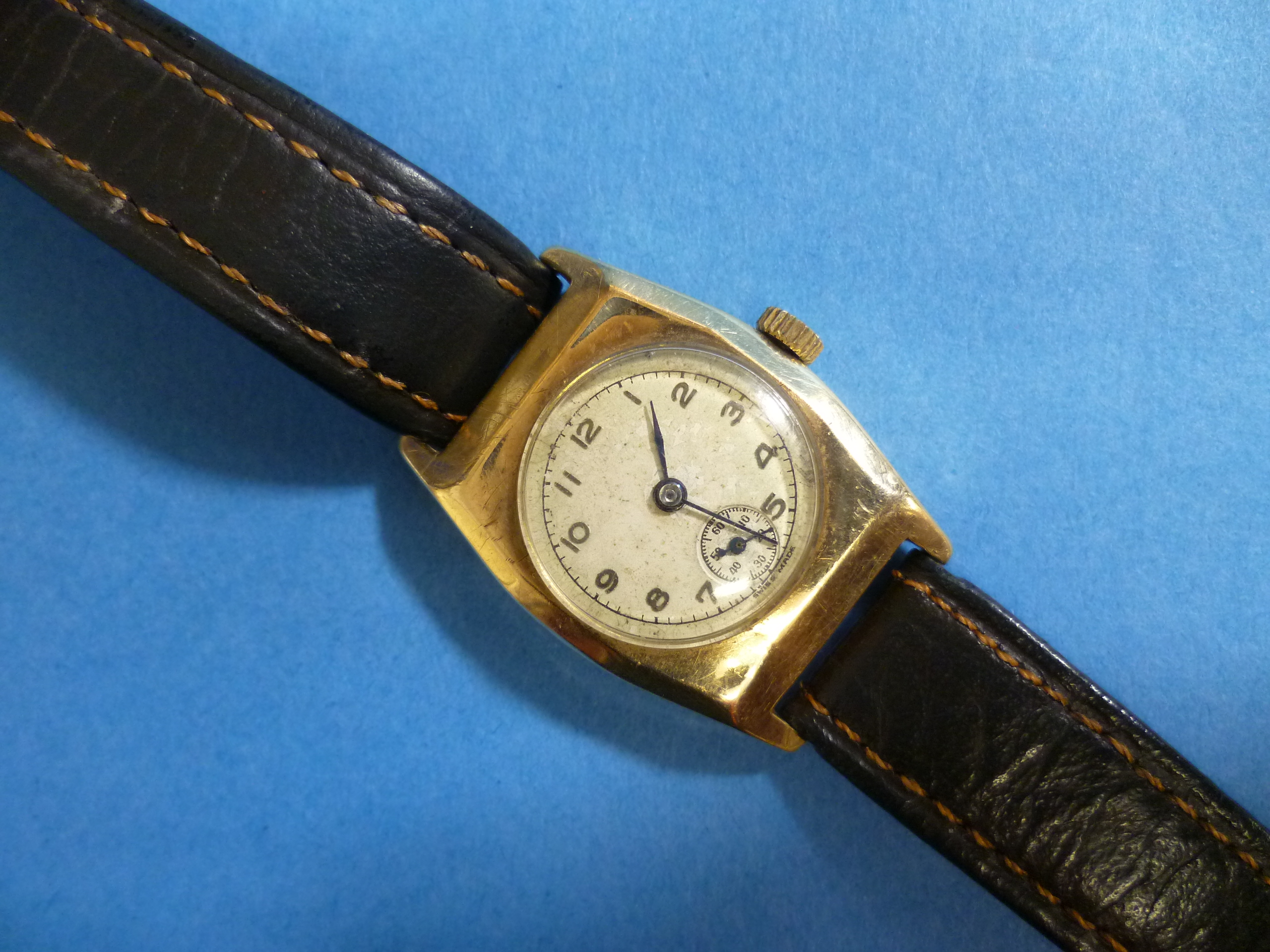A vintage 9ct gold cased lady's Wrist Watch, of shaped rectangular form with circular dial, Swiss