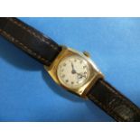 A vintage 9ct gold cased lady's Wrist Watch, of shaped rectangular form with circular dial, Swiss